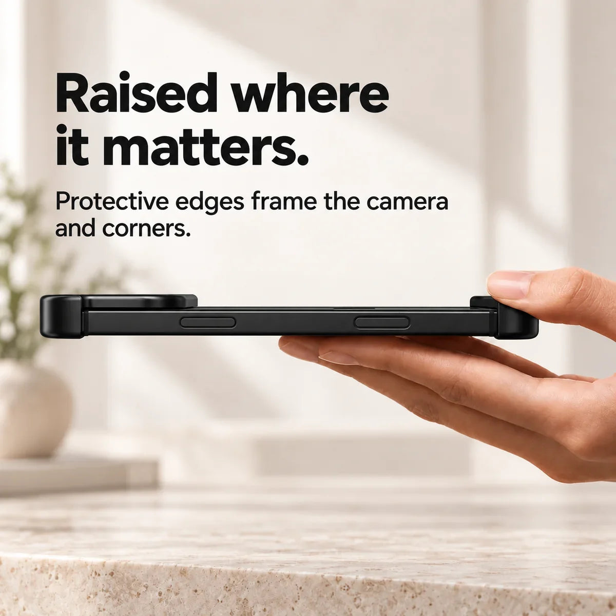 Black metal phone bumper in a horizontal side view showing raised end protection #color_Midnight Black
