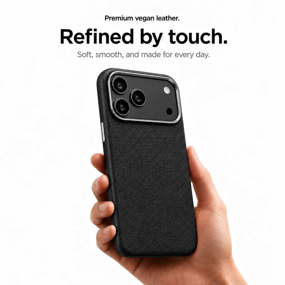 Black textured leather phone case held upright in one hand #color_Stealth Black
