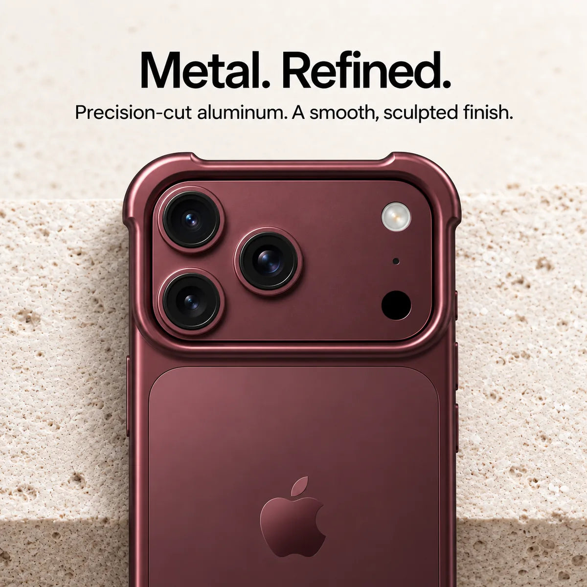 Burgundy metal phone bumper in a close-up of the sculpted camera surround #color_Burgundy