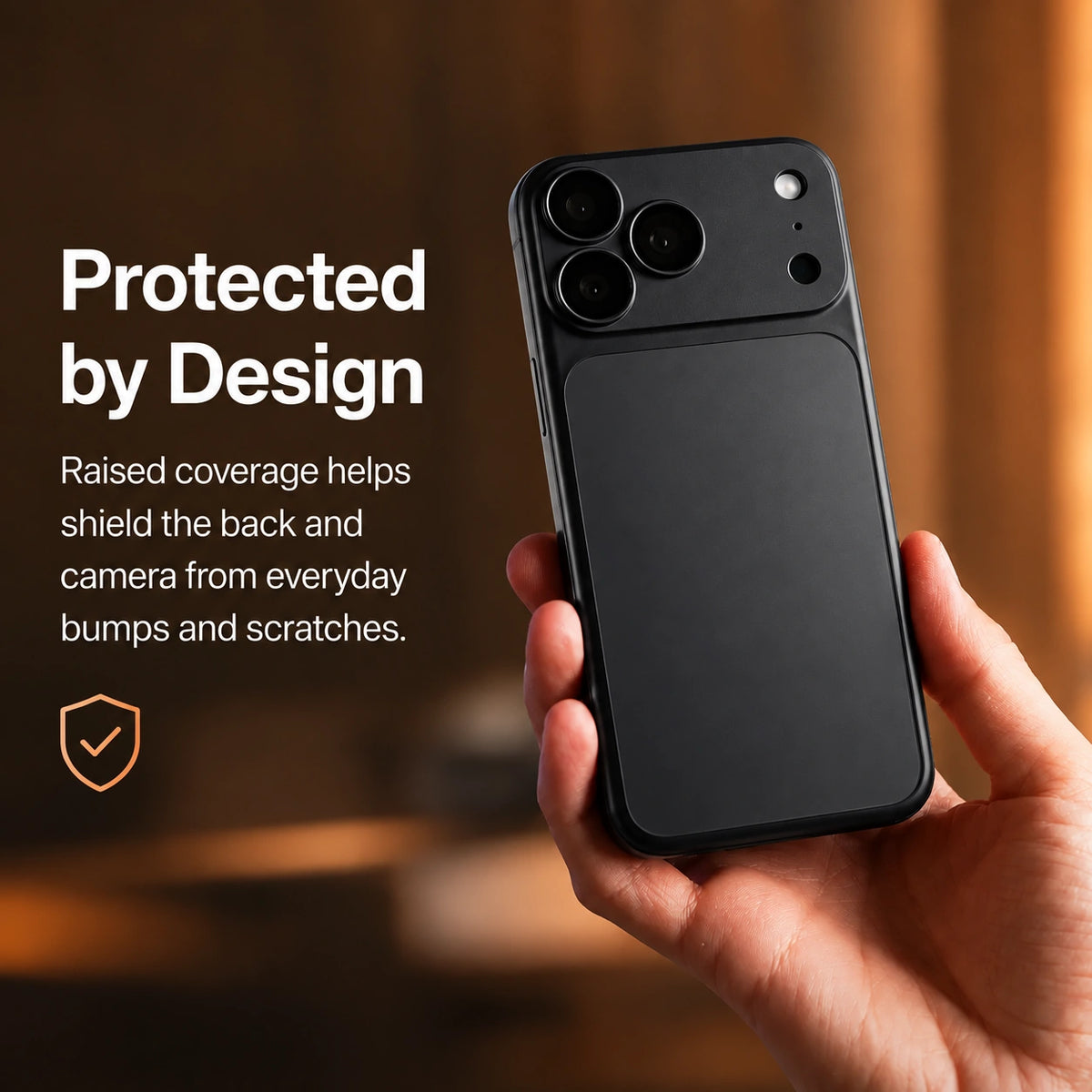 Midnight Black magnetic protective phone backplate held with raised camera protection #color_Midnight Black