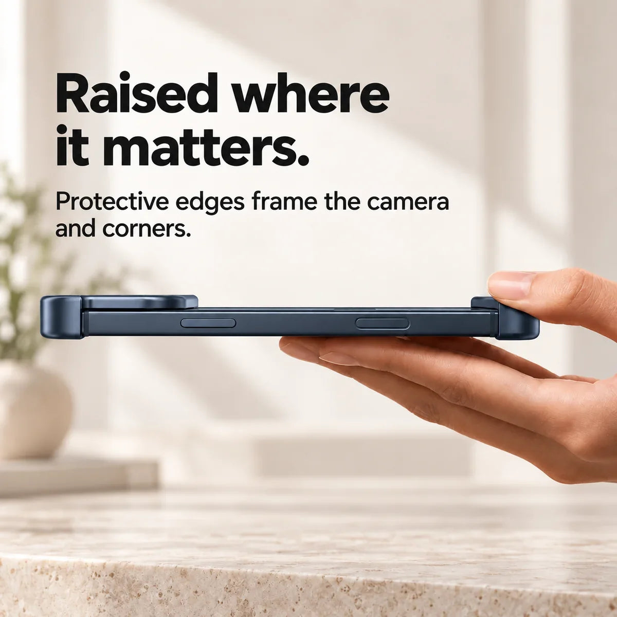 Dark blue metal phone bumper in a horizontal side view showing raised end protection #color_Deep Blue