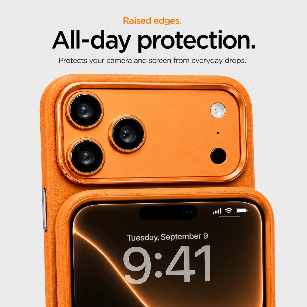Orange textured leather phone case held horizontally in two hands with side buttons visible #color_Cosmic Orange