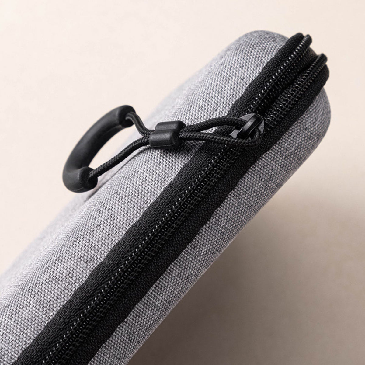 Travel case zipper and carrying clip detail