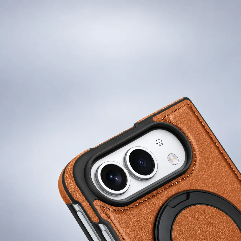 Close-up of the raised black surround around two camera lenses on a brown PU leather phone case.