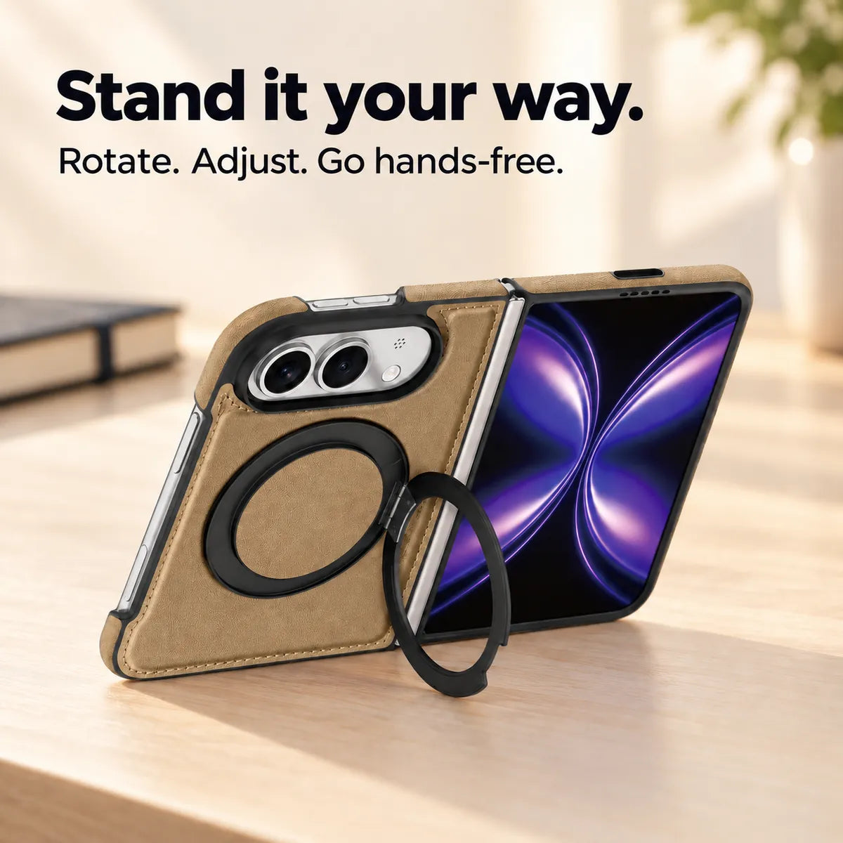 Textured synthetic leather folding phone case with its ring stand deployed on a desk. #color_Desert Gold