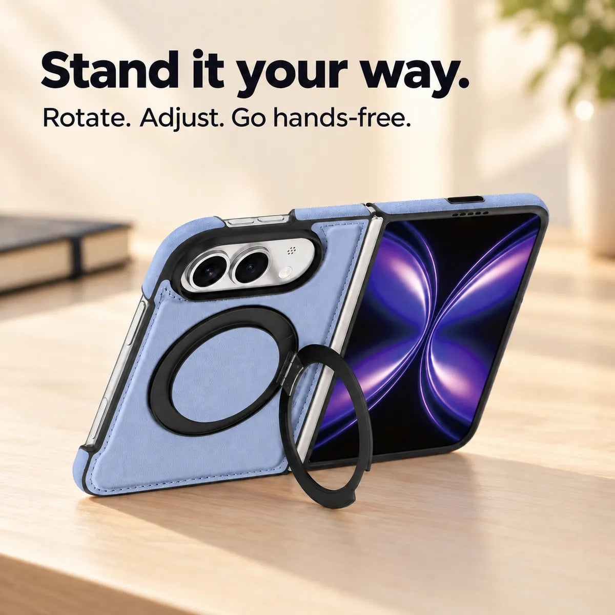 Textured synthetic leather folding phone case with its ring stand deployed on a desk. #color_Glacier