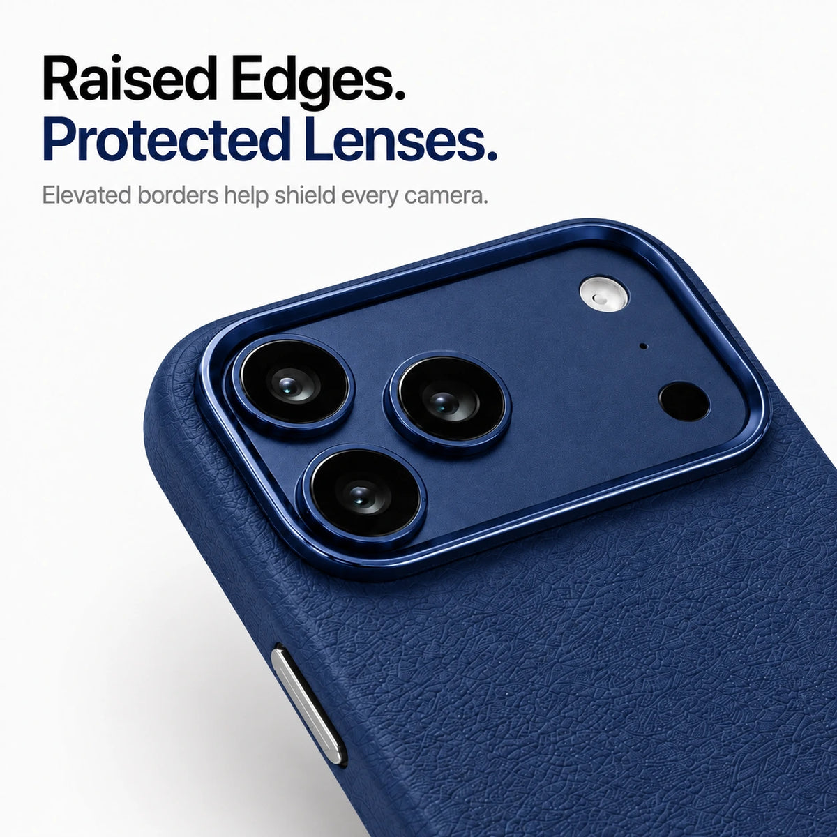 Navy blue textured leather phone case in close-up showing the raised camera surround and lens edges #color_Deep Blue