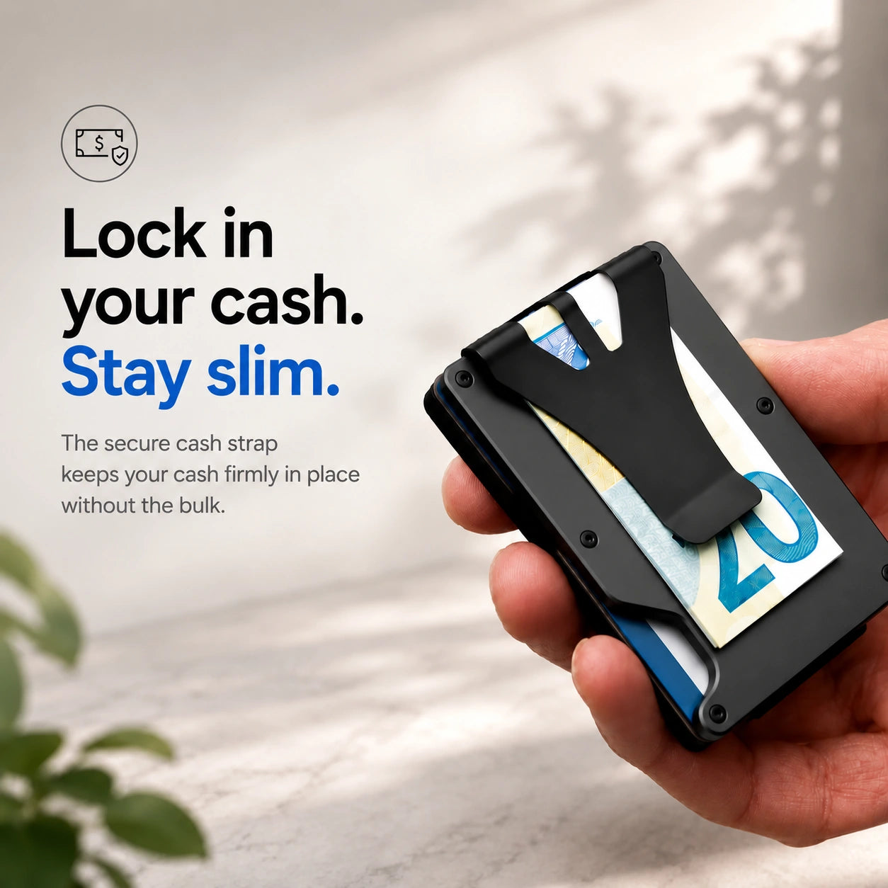 Obsidian Black slim tracking card wallet holding cash under the clip #color_Obsidian Black