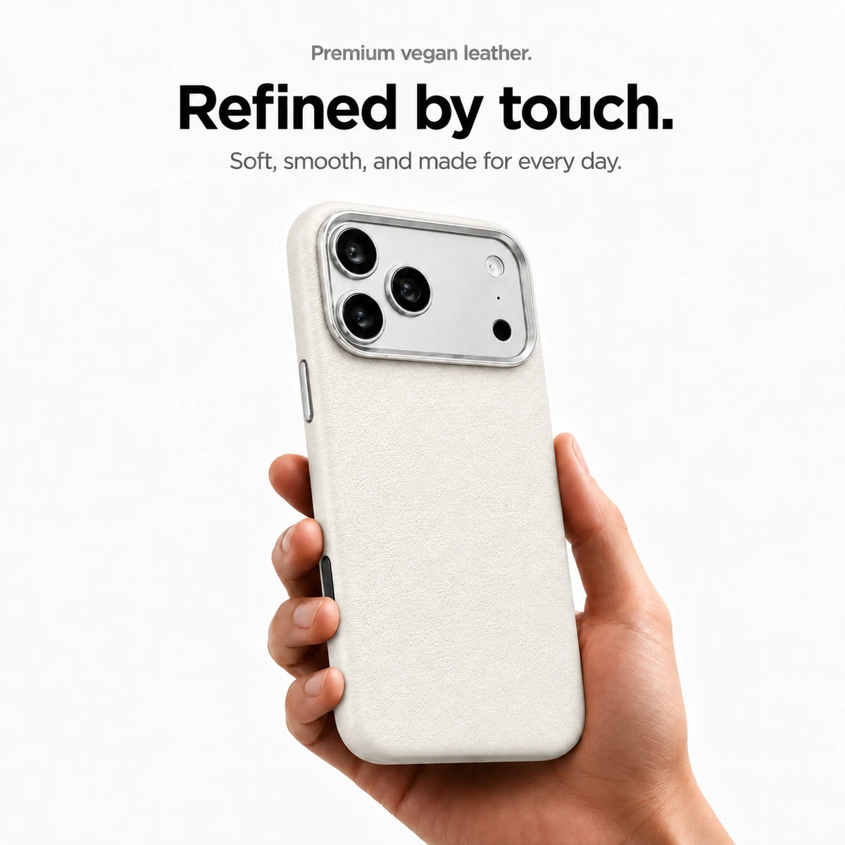 White textured leather phone case held upright in one hand #color_Arctic White